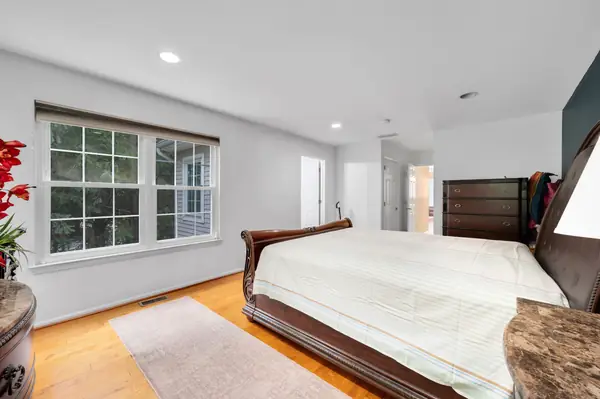 Primary suite with natural light and closet