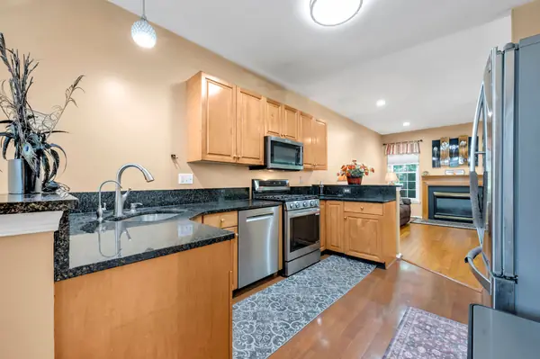 Kitchen with granite countertops and stainless appliances