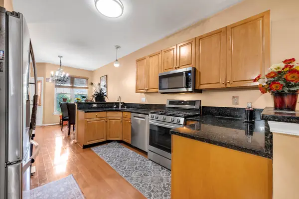 Eat-in kitchen showing gas range and cabinetry