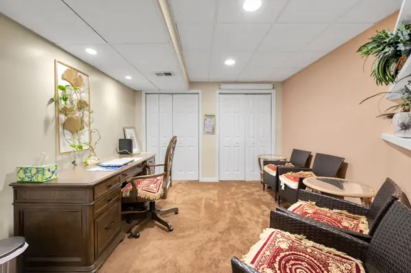 Finished basement private office with California Closets